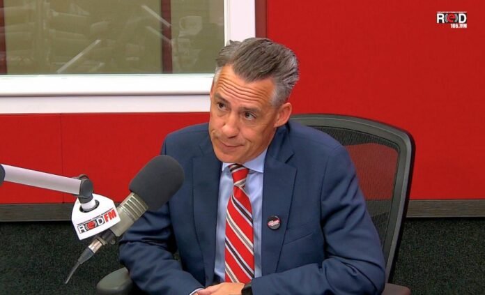 Brian Thiessen speaking at RED FM during his mayoral campaign.